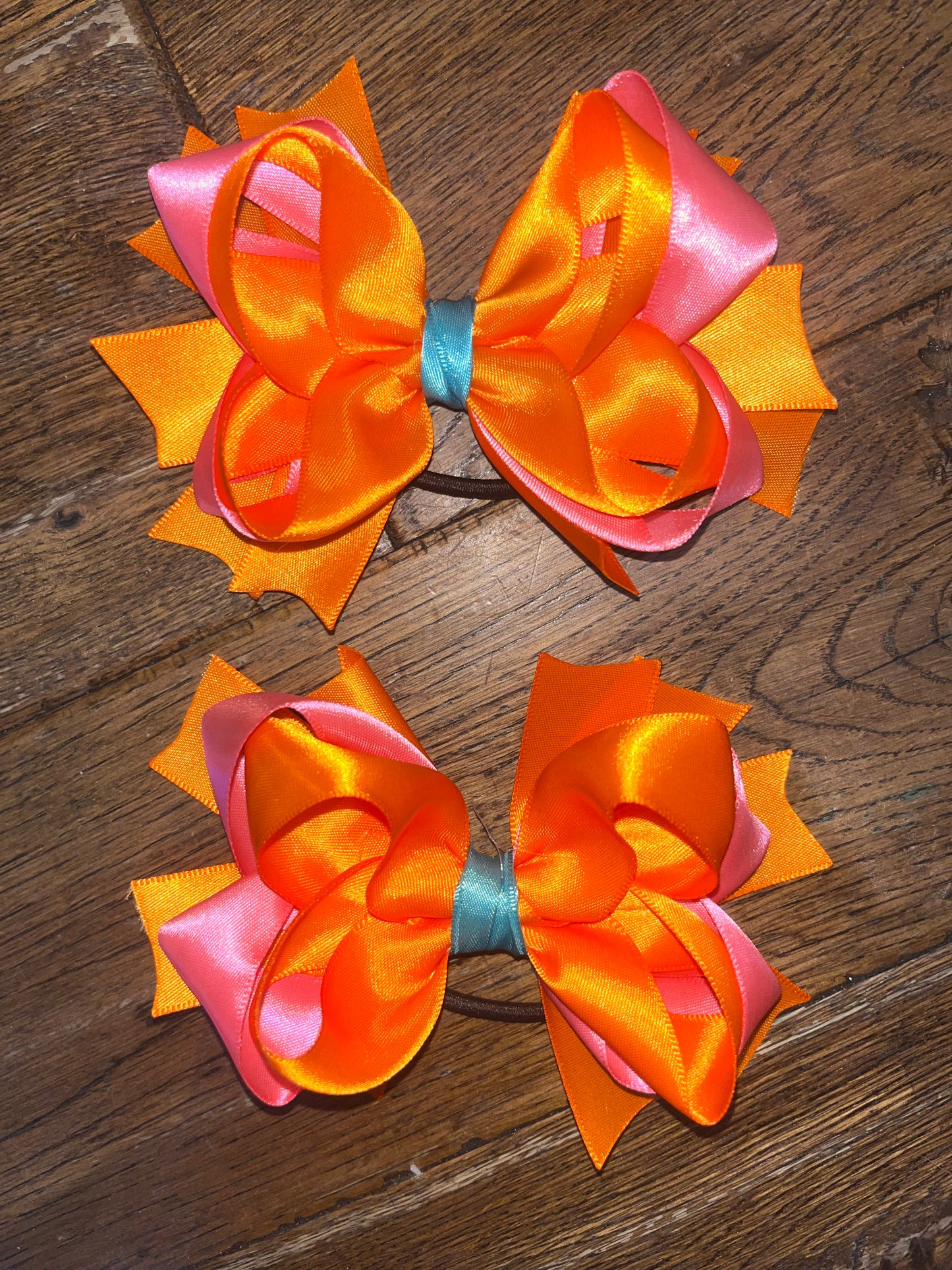 orange and pink bright bows