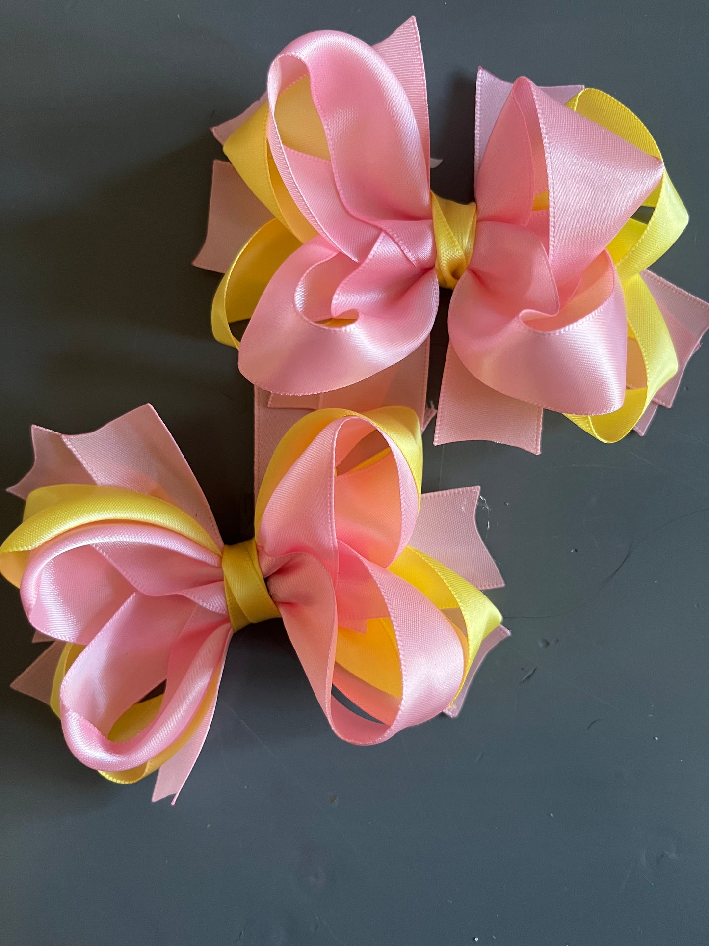 pink and lemon pair of bows