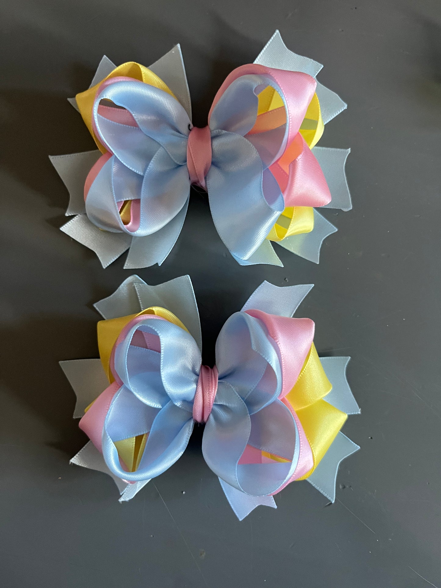 blue pastel pair of bows